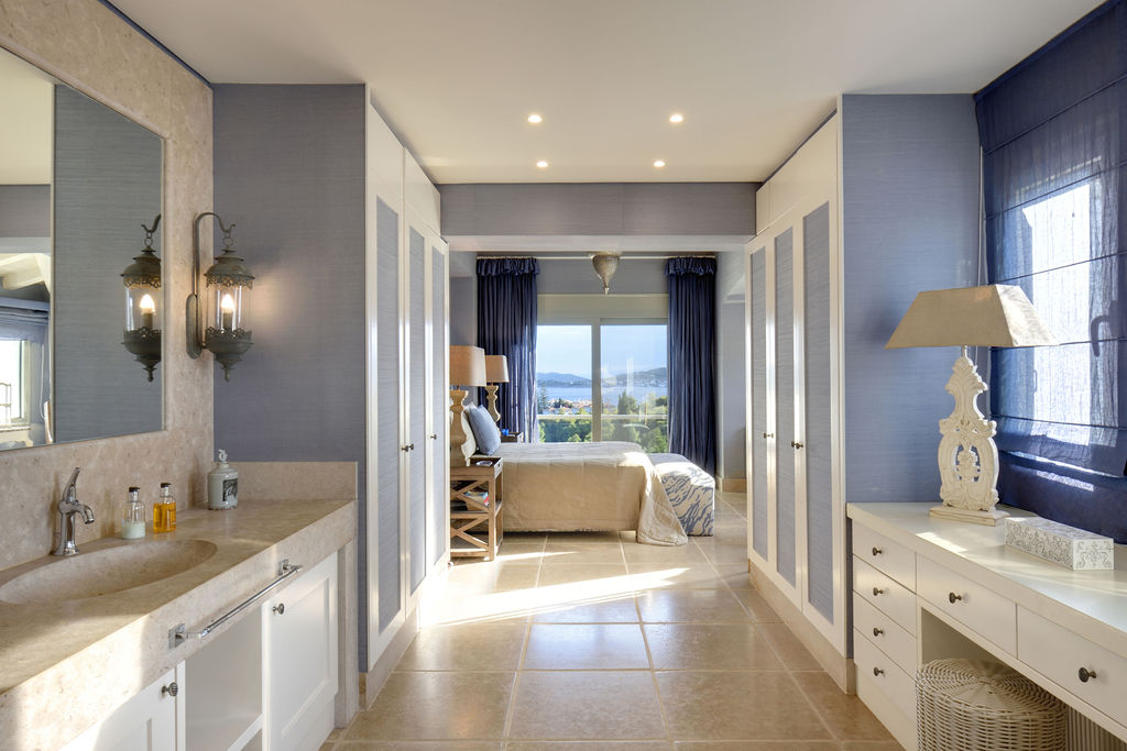 Bedroom with dressing area and sea view